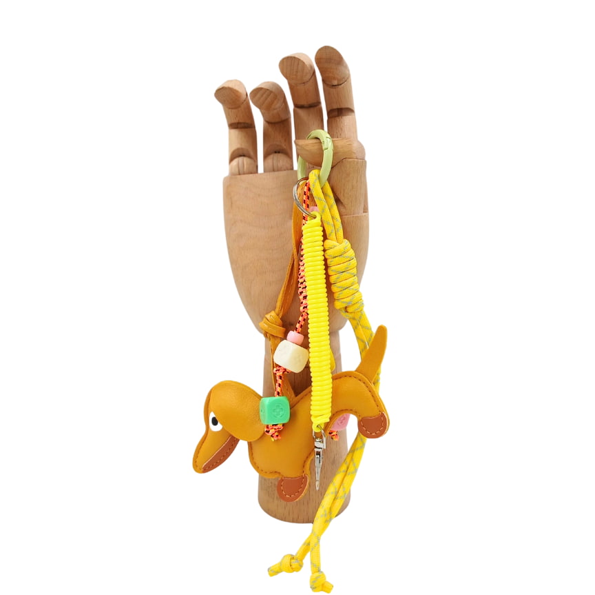 CHARM AMARILLO PERRO